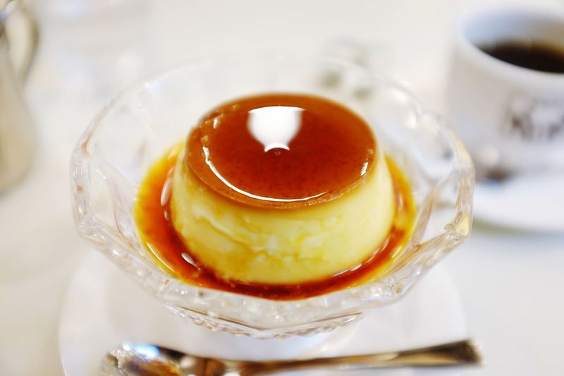 Close-up of flan served in bowl on table