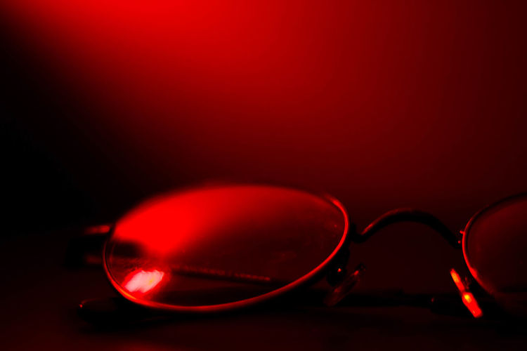 Glasses with red lights 