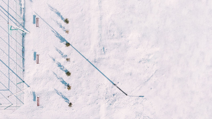 High angle view of snow covered field