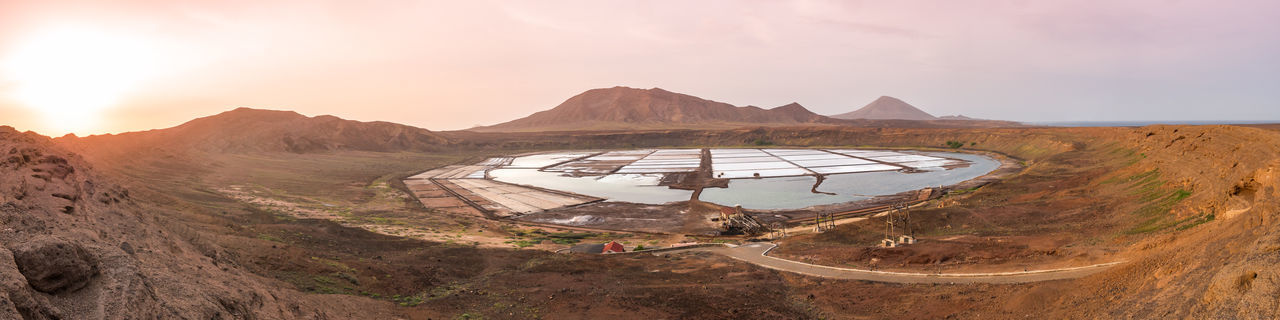 Panoramic view of salt farm against landscape
