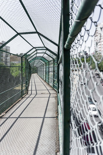 Metal fence in greenhouse