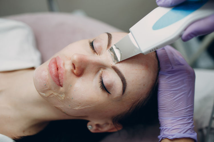 Close-up of woman having beauty treatment at spa