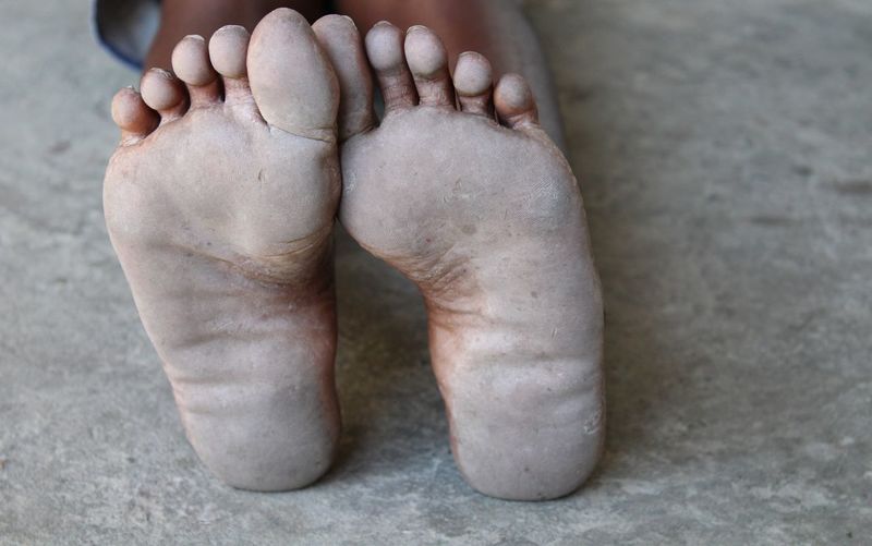 Close up of dusty feet