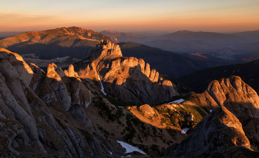 Scenic view of mountains against sky during sunset in ciucas mountains 