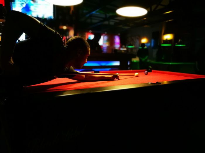 Man playing pool at club