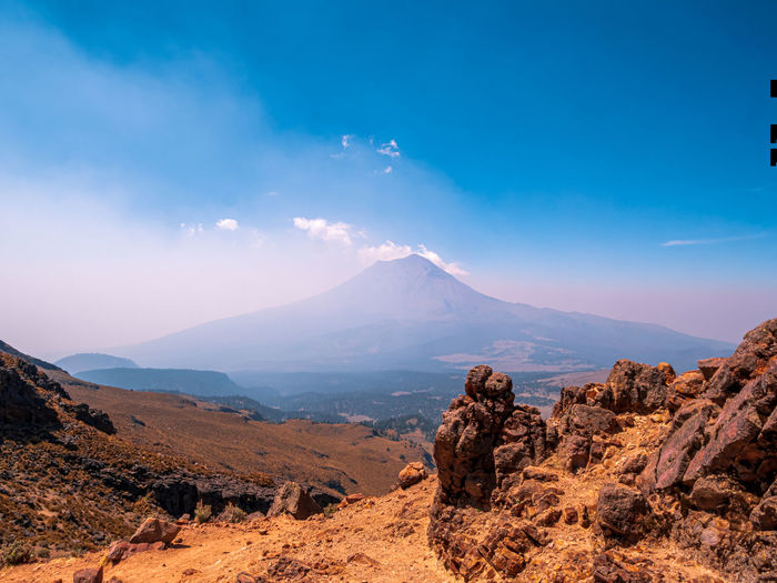Panoramic view of landscape and mountains against sky