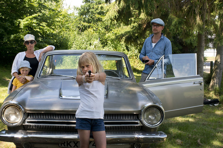 A family and a car