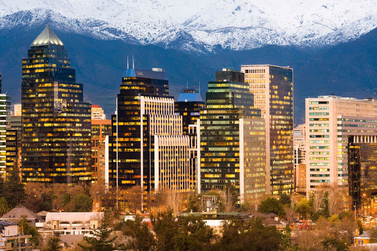 View of cityscape against mountain range