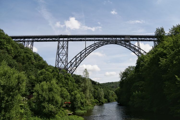 Bridge over river against sky
