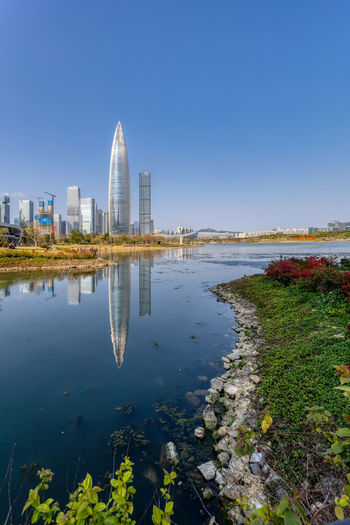 Reflection of buildings on water in city