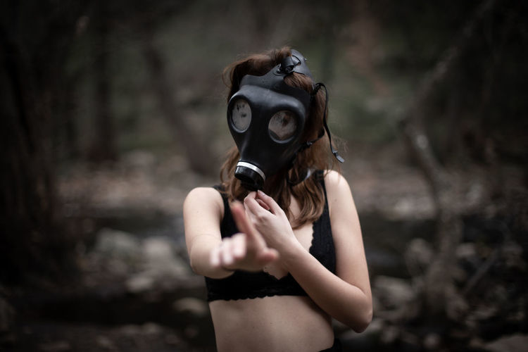 Woman wearing gas mask
