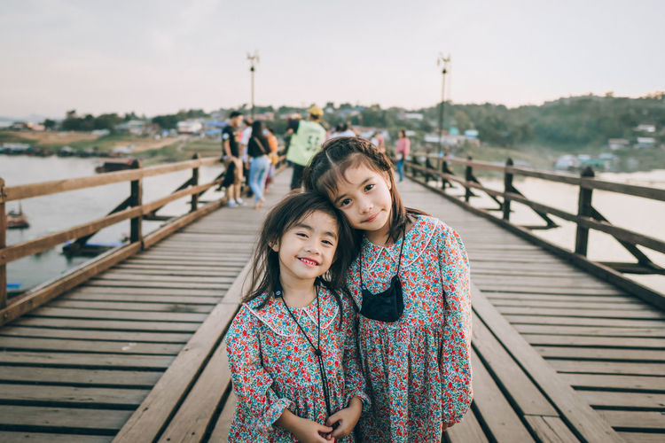 Two children travel at mon bridge bridge