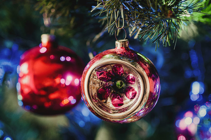 Retro christmas ball on christmas tree closeup, holiday home decoration