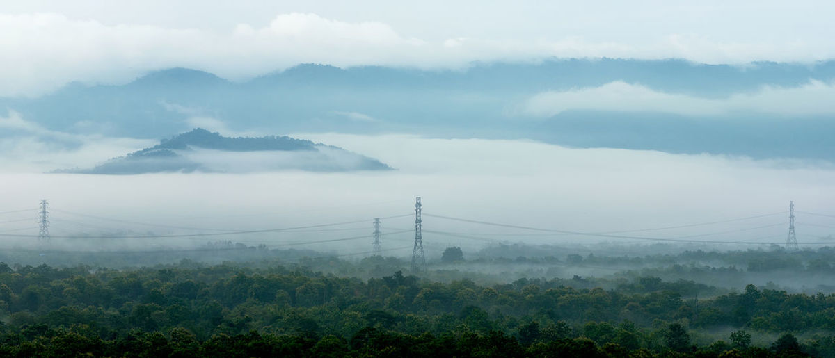 Panorama aerial view transmission tower and beautiful morning smooth fog. mae moh, lampang.