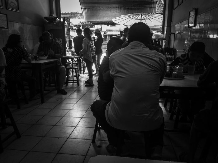Rear view of people at restaurant
