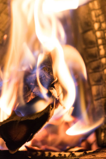 Close-up of campfire against black background