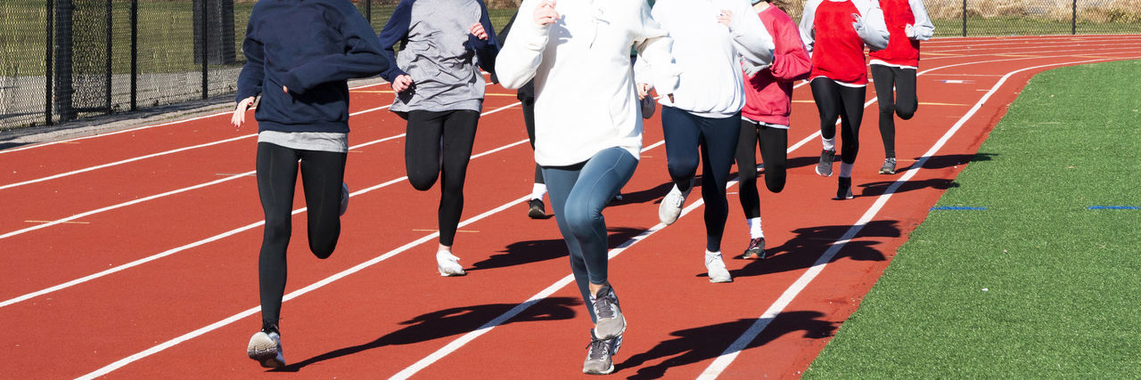 Low section of people running outdoors