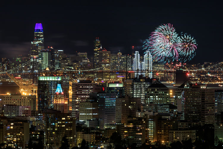Oakland and san francisco downtowns with new year's eve 2019 fireworks