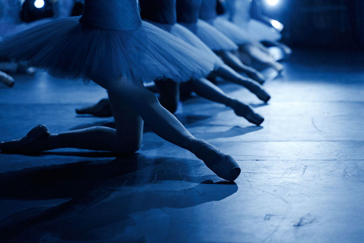 Low section of women dancing on floor