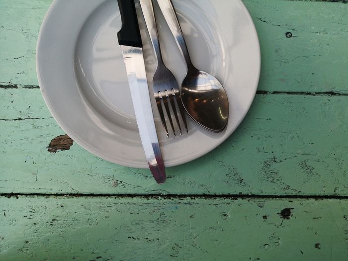 High angle view of empty plate on table