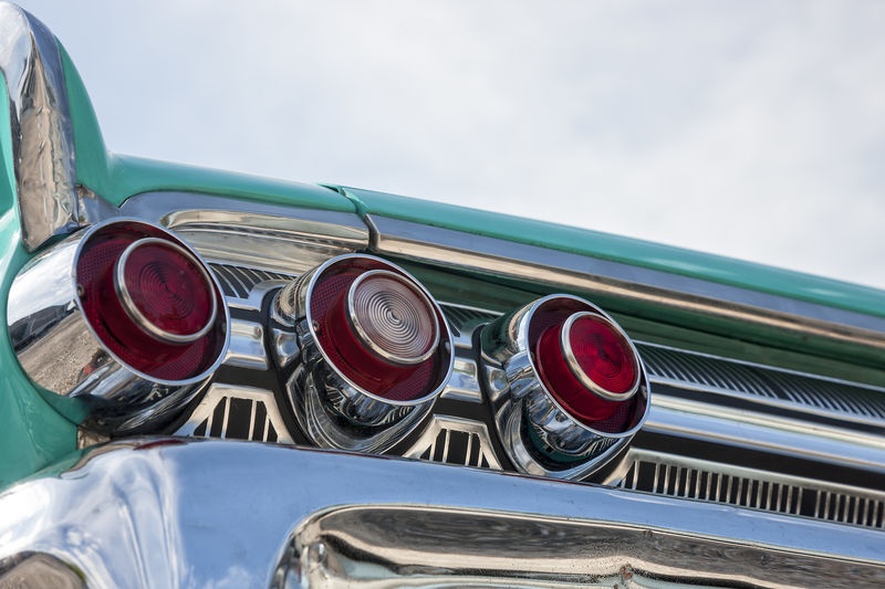 Low angle view of vintage car against sky