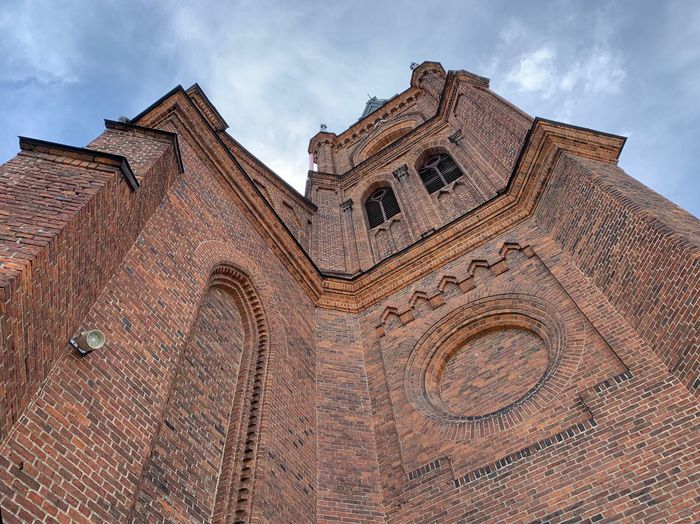 Low angle view of ornate building against sky