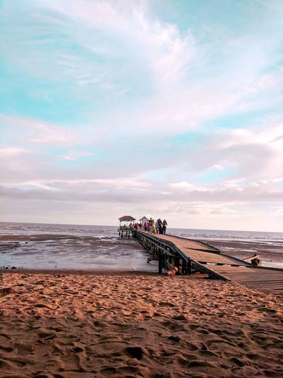 Scenic view of beach against sky