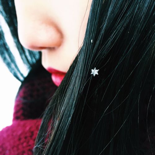 Snowflake in woman's hair