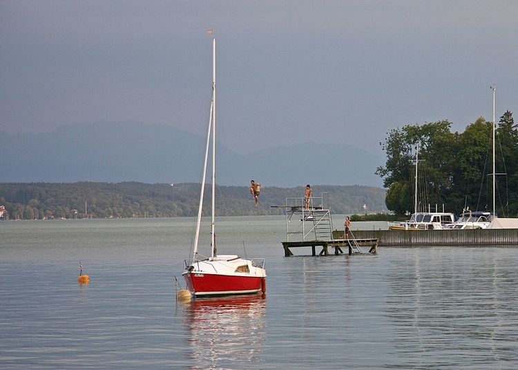 Boats sailing on lake