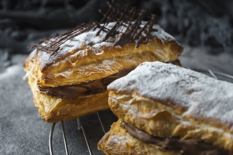 Puff pastry with confectioner's sugar and chocolate filling