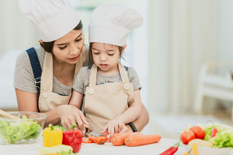Full length of woman preparing food