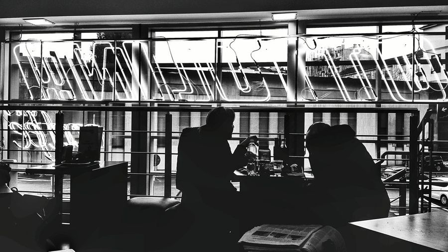 Woman sitting in shelf