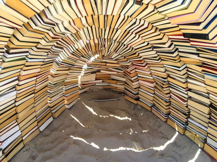 Hut made with books on sand