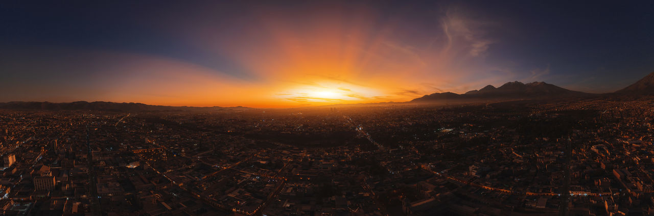 Aerial view of a sunset in arequipa city with chachani volcano as background, peru