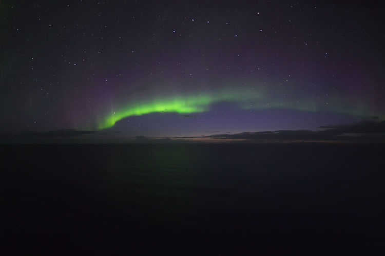 Northern lights over the sea at iceland