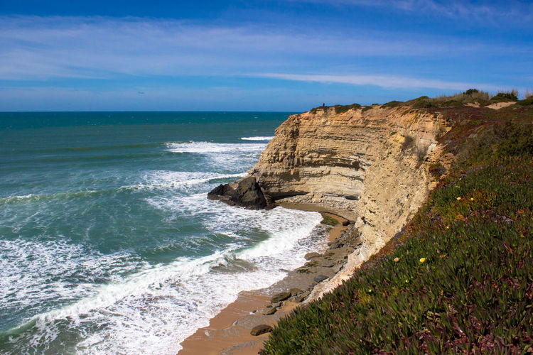 Scenic view of rocky coastline in portugal