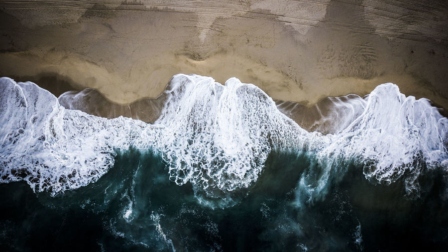 Aerial view of waves at beach