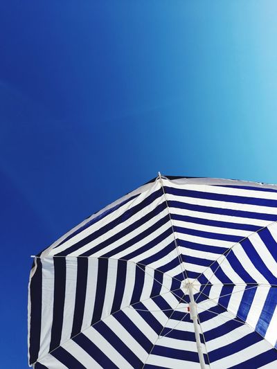 Sunbrella on blue sky