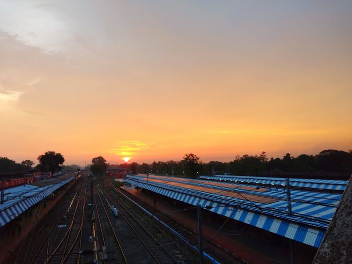 High angle view of train against sky during sunset