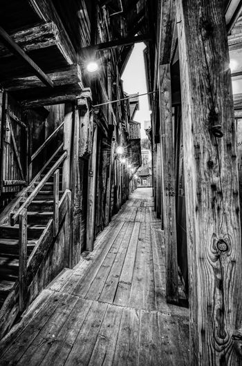 Empty alley amidst buildings