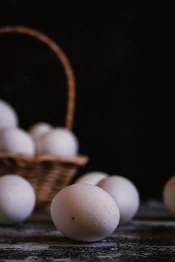 Close-up of eggs in basket on table