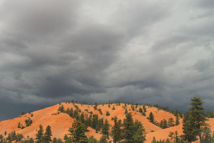 Scenic view of mountains against cloudy sky at dixie national forest