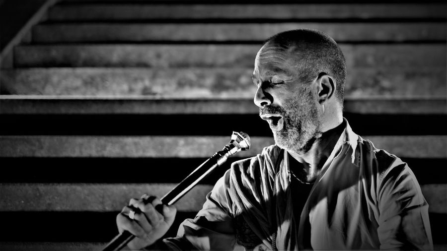 Close-up of mature man singing