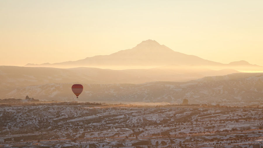 Hot air balloon flying landscape