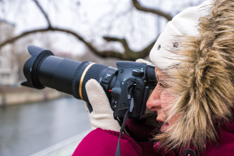 Close-up of woman photographing