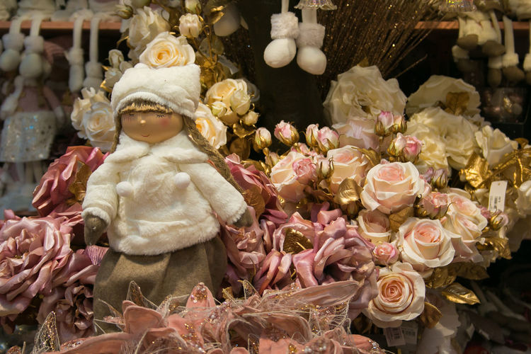 Close-up of toy and flowers