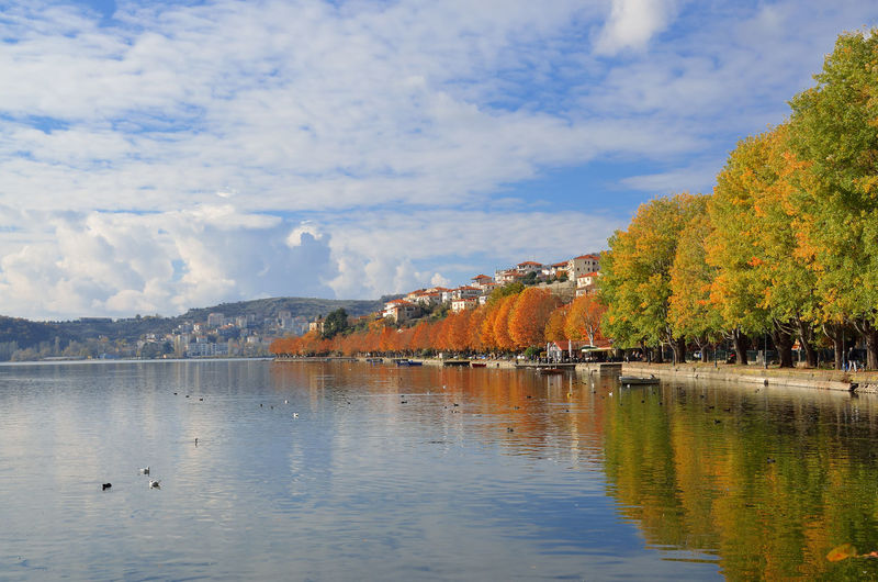 Kastoria lake waterfront at autumn in kastoria, greece