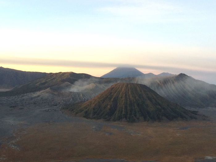 Scenic view of mount bromo against sky during sunset