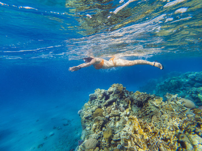 Woman snorkeling in sea