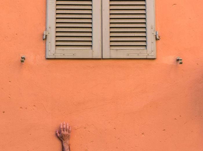 Hand on a wall